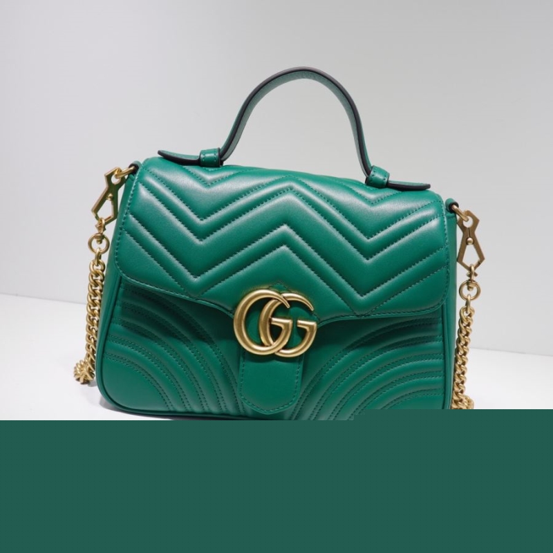 G*u*i top handle bags